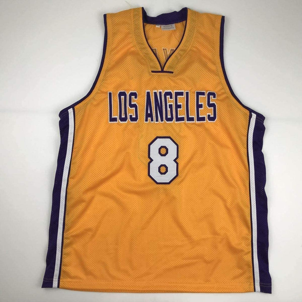 autographed-signed-kobe-bryant-8-los-angeles-yellow-basketball-jersey-psa-dna-coa