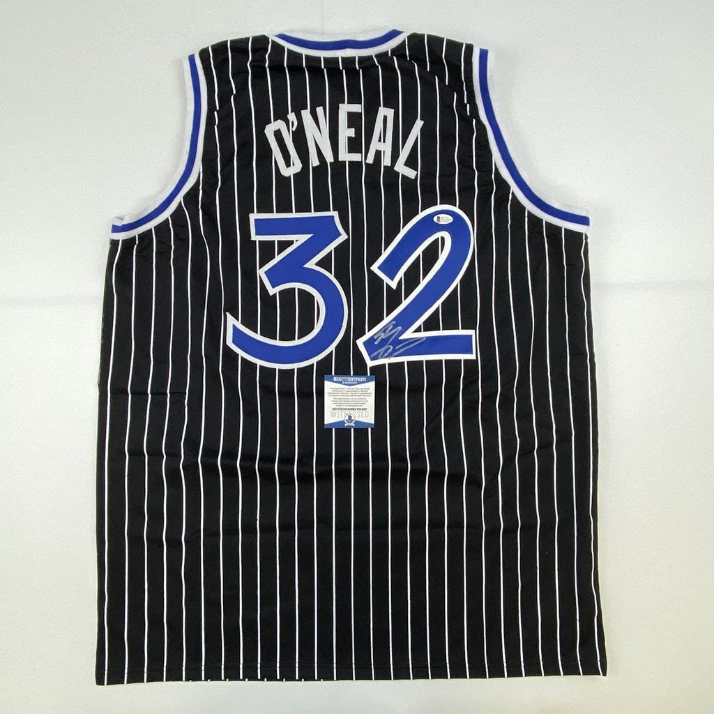autographed-signed-shaquille-shaq-oneal-orlando-black-pinstripe-basketball-jersey-beckett-bas-coa
