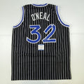 autographed-signed-shaquille-shaq-oneal-orlando-black-pinstripe-basketball-jersey-beckett-bas-coa