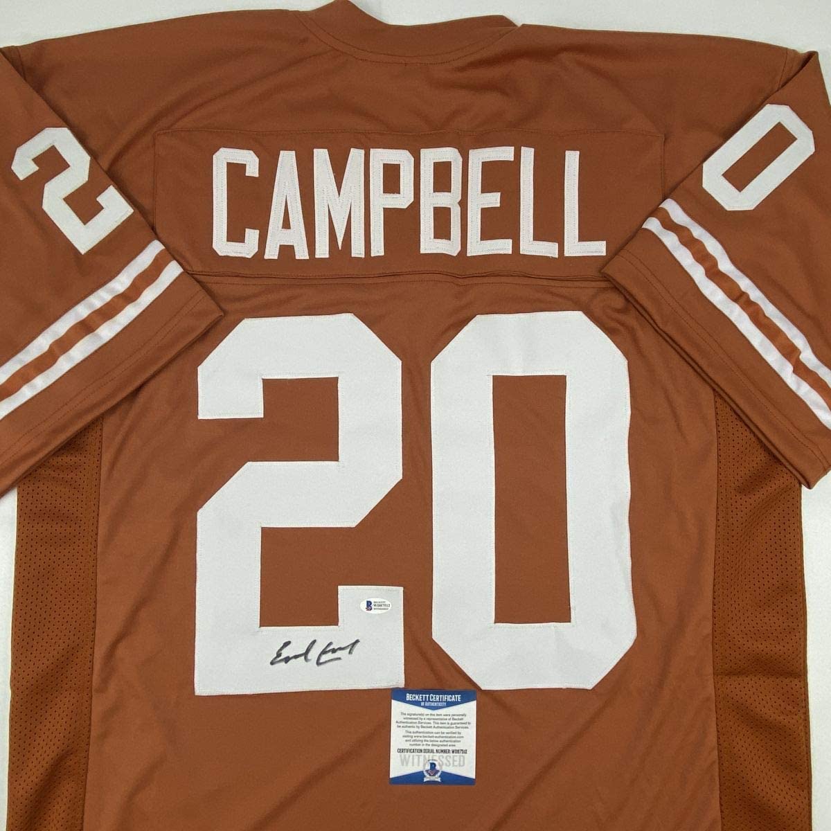 autographed-signed-earl-campbell-texas-orange-football-jersey-beckett-bas-coa