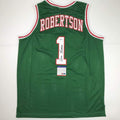 autographed-signed-oscar-robertson-milwaukee-green-basketball-jersey-psa-dna-coa