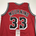 autographed-signed-alonzo-mourning-miami-red-basketball-jersey-jsa-coa