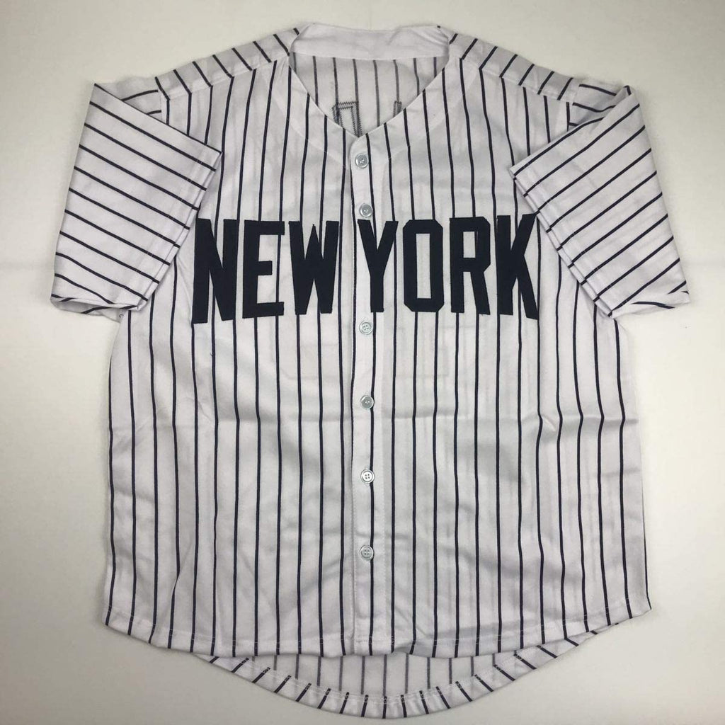 autographed-signed-cecil-fielder-new-york-pinstripe-baseball-jersey-jsa-coa