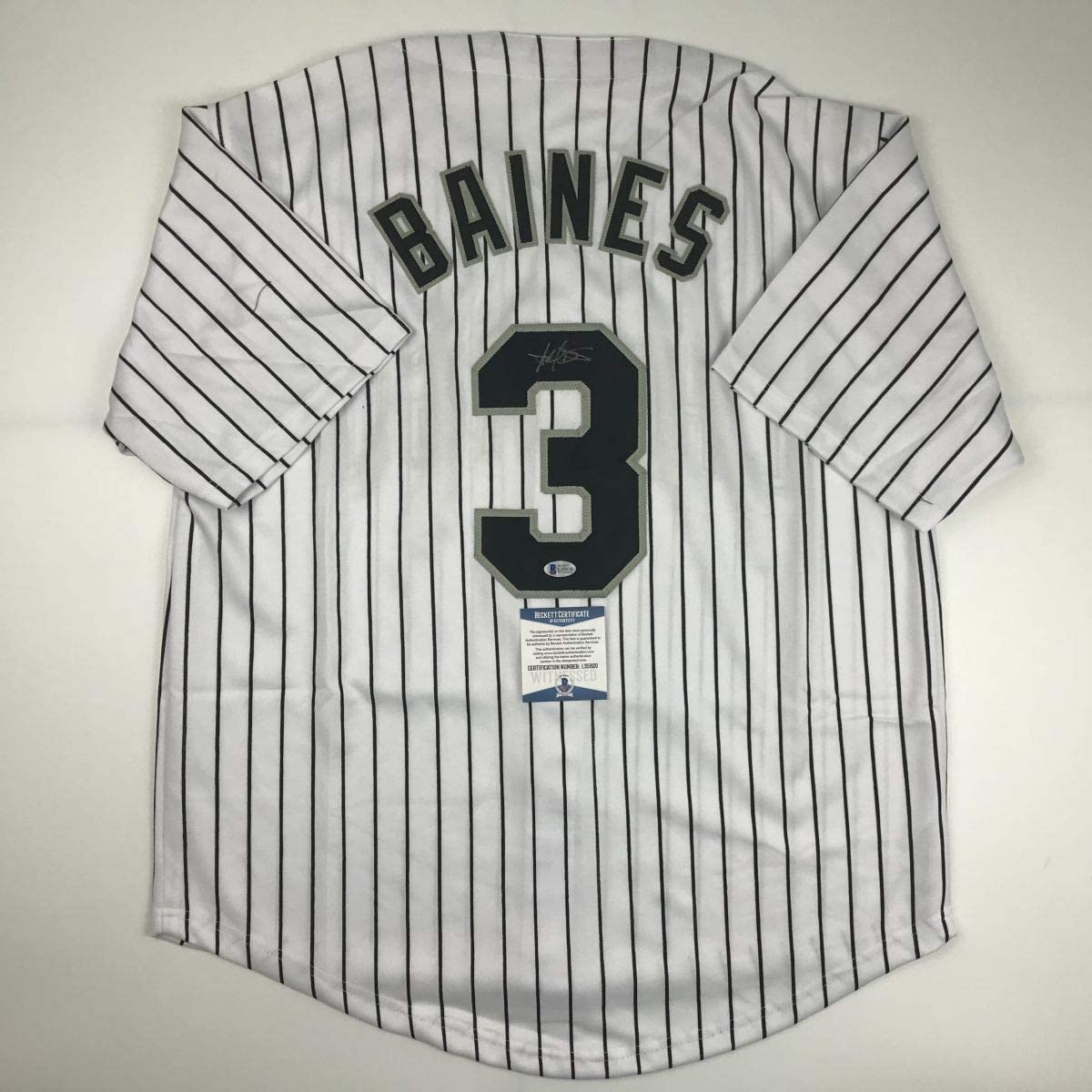 autographed-signed-harold-baines-chicago-pinstripe-baseball-jersey-beckett-bas-coa