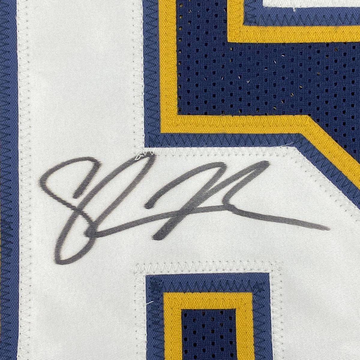 autographed-signed-shawne-merriman-san-diego-dark-blue-football-jersey-beckett-bas-coa