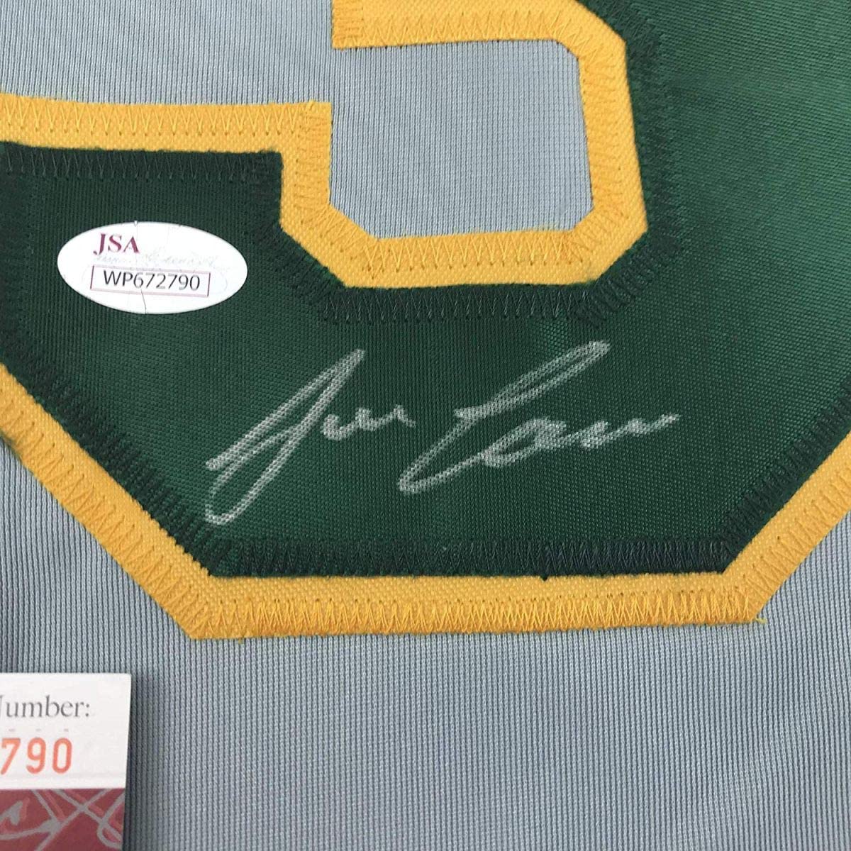autographed-signed-jose-canseco-oakland-grey-baseball-jersey-jsa-coa