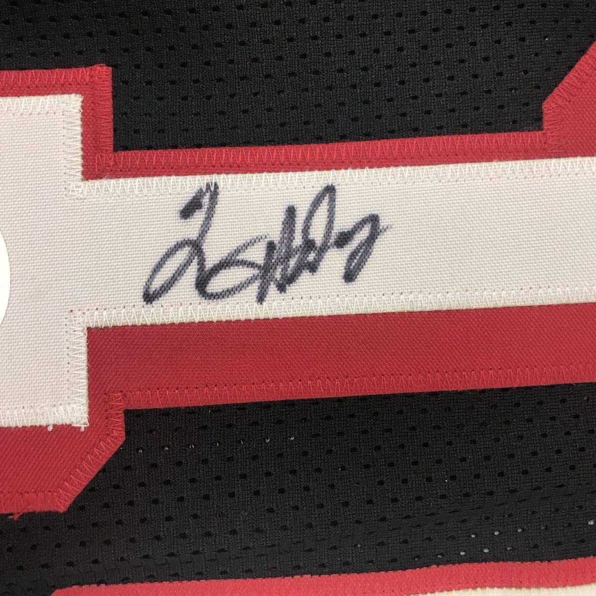 autographed-signed-tim-hardaway-miami-black-basketball-jersey-jsa-coa