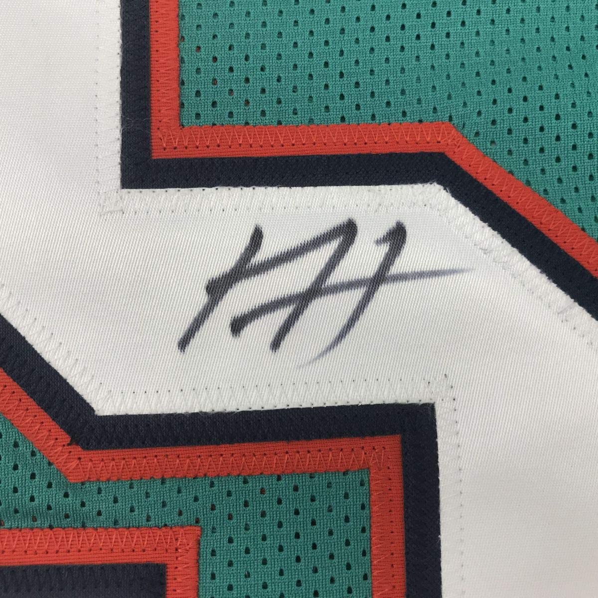 autographed-signed-xavien-howard-miami-teal-football-jersey-psa-dna-coa