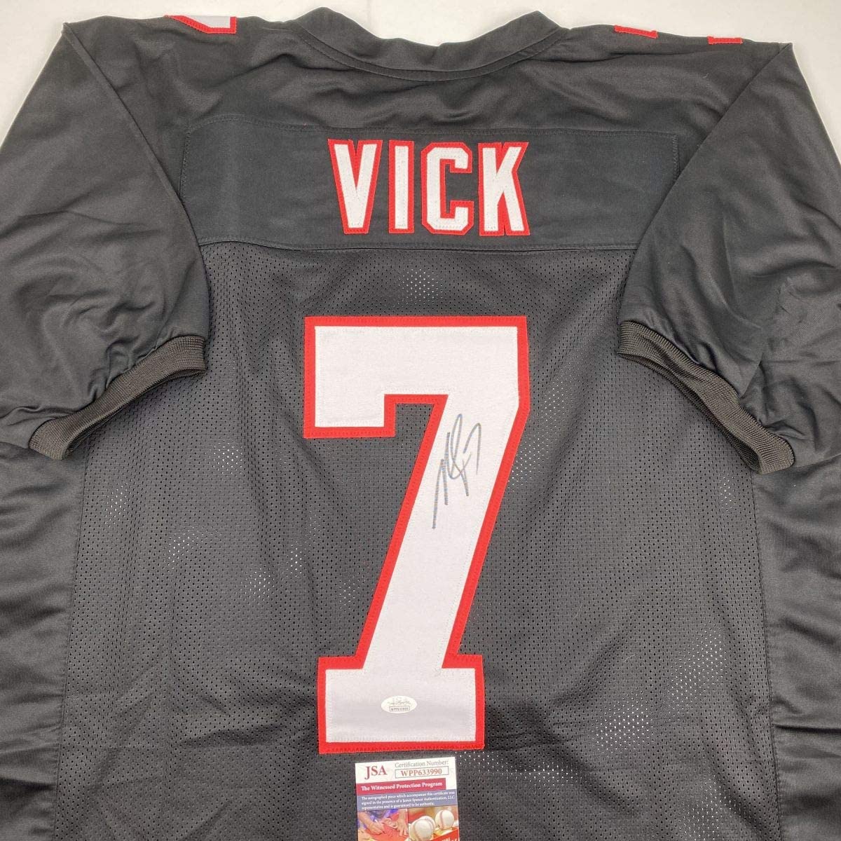 autographed-signed-michael-mike-vick-atlanta-retro-black-football-jersey-jsa-coa