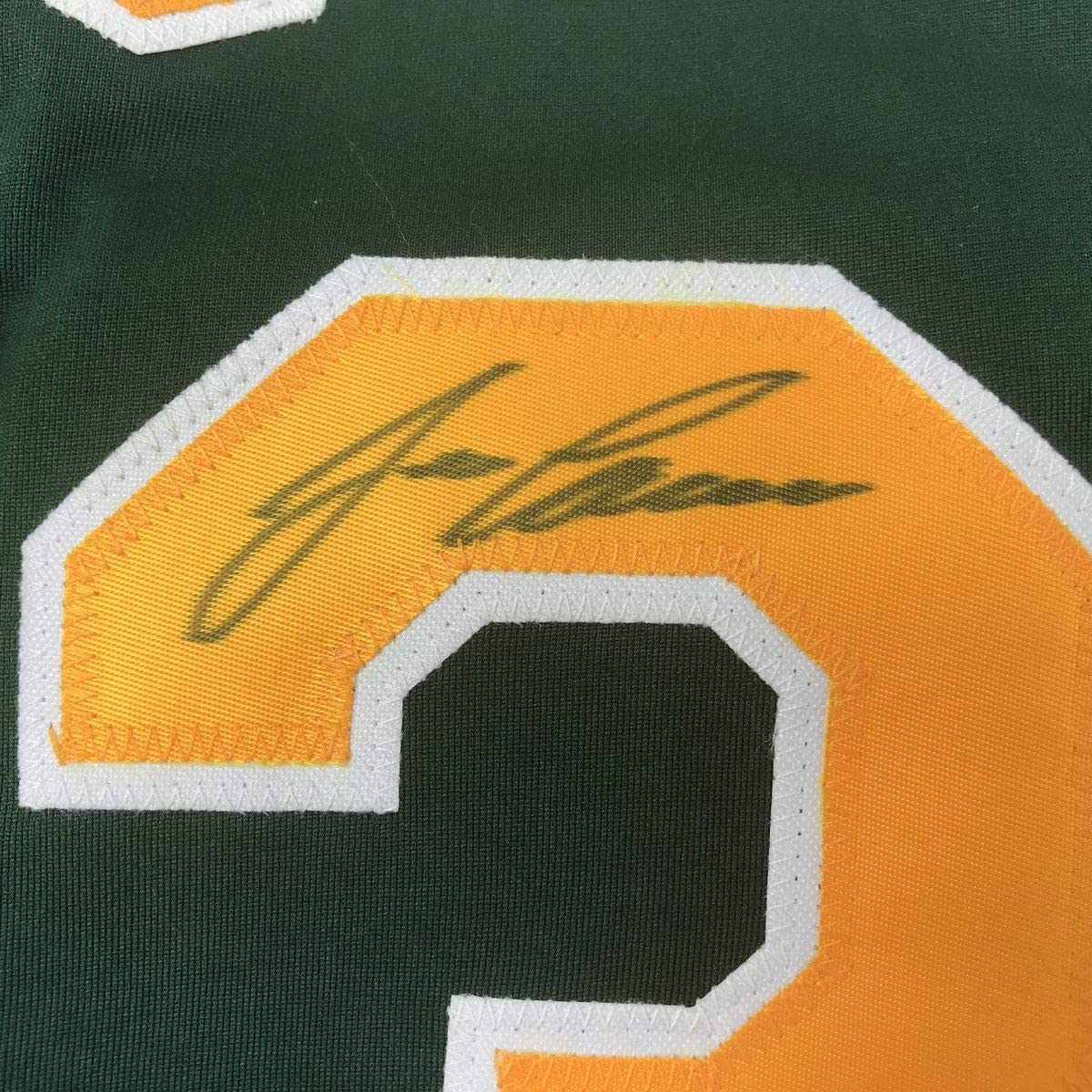 autographed-signed-jose-canseco-oakland-dark-green-baseball-jersey-jsa-coa