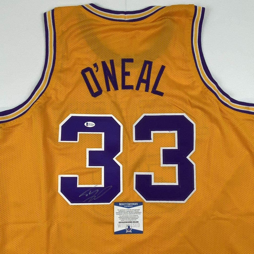 autographed-signed-shaquille-shaq-oneal-lsu-yellow-basketball-jersey-beckett-bas-coa