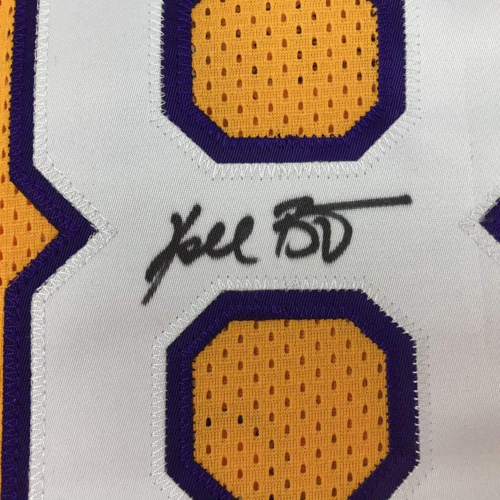 autographed-signed-kobe-bryant-8-los-angeles-yellow-basketball-jersey-psa-dna-coa