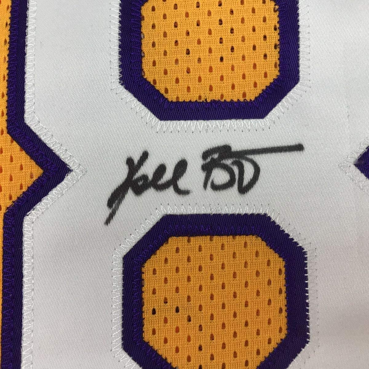 autographed-signed-kobe-bryant-8-los-angeles-yellow-basketball-jersey-psa-dna-coa