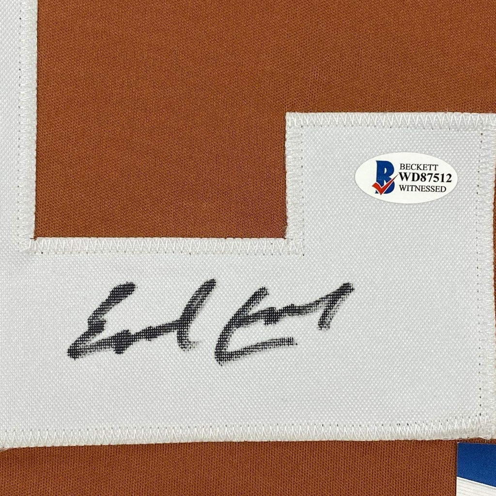 autographed-signed-earl-campbell-texas-orange-football-jersey-beckett-bas-coa