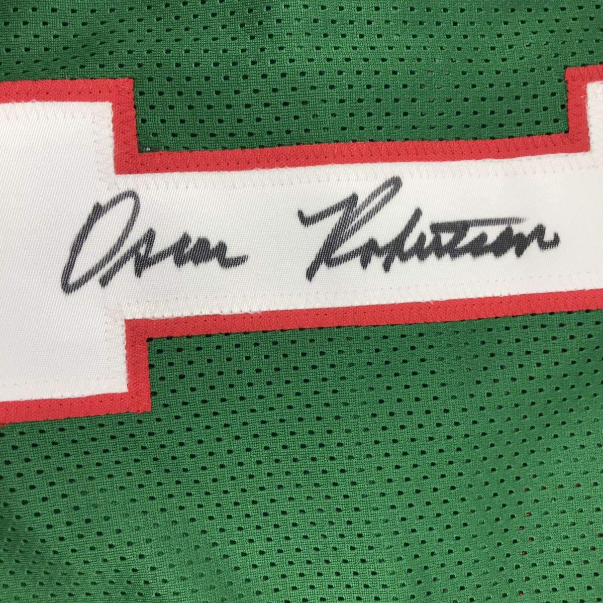 autographed-signed-oscar-robertson-milwaukee-green-basketball-jersey-psa-dna-coa