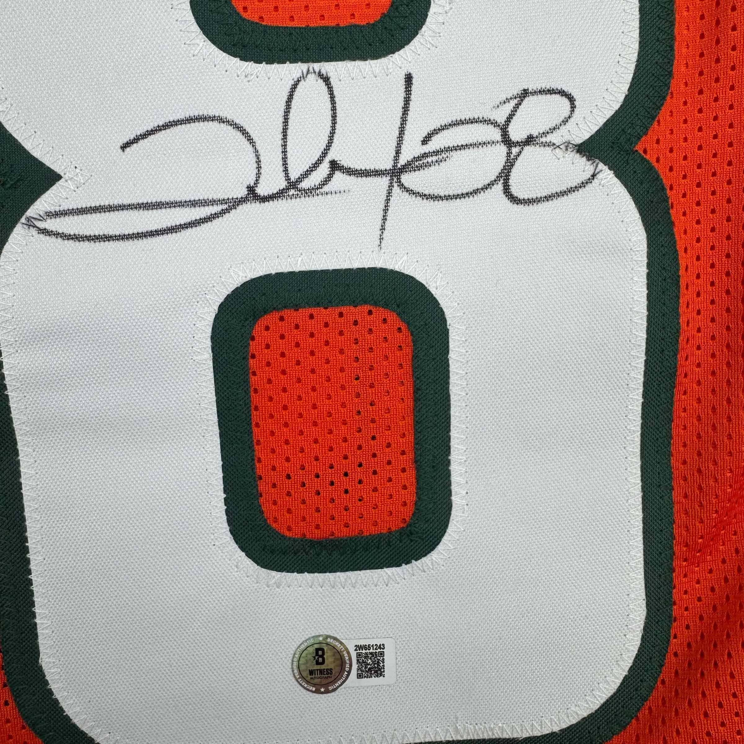 autographed-signed-clinton-portis-miami-orange-college-football-jersey-beckett-bas-coa