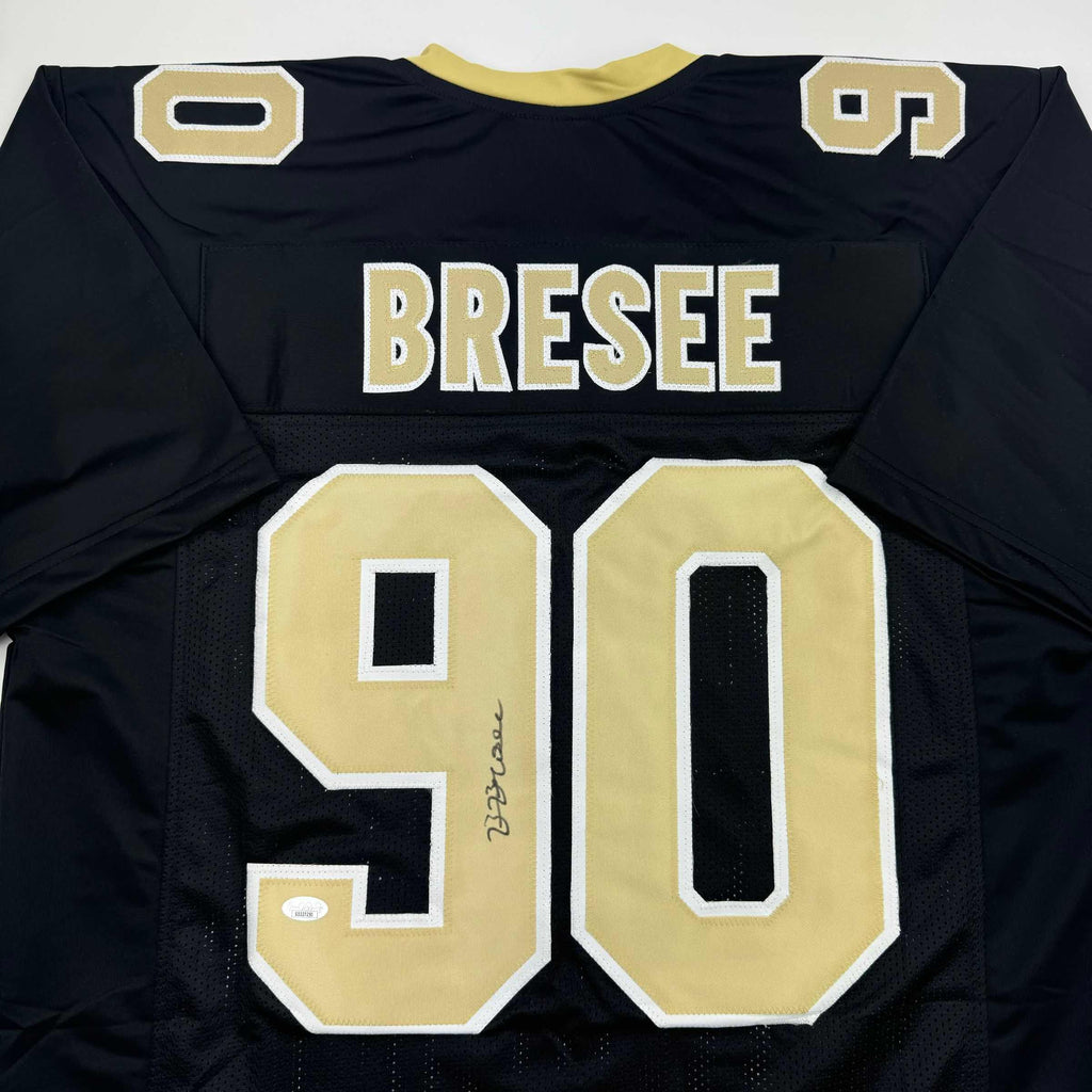 autographed-signed-bryan-bresee-new-orleans-black-football-jersey-jsa-coa