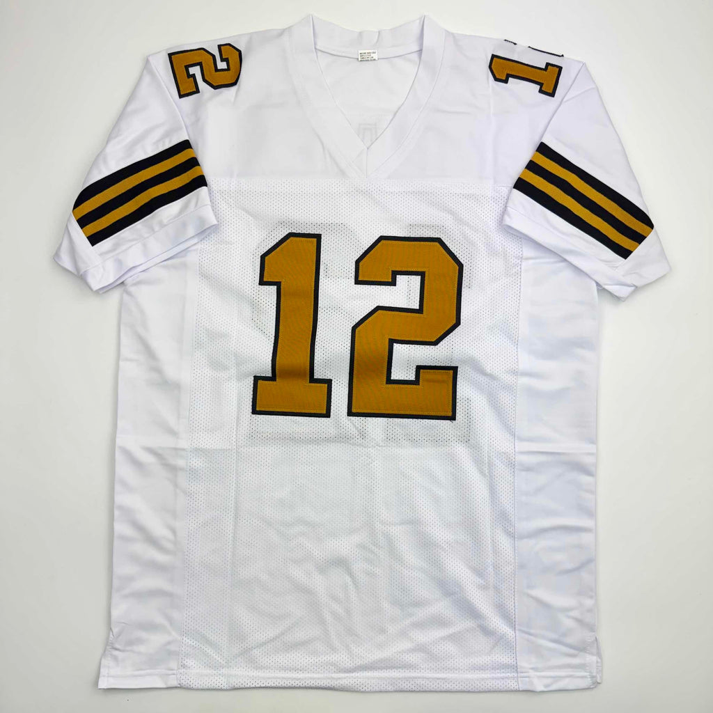 autographed-signed-chris-olave-new-orleans-white-color-rush-football-jersey-beckett-bas-coa
