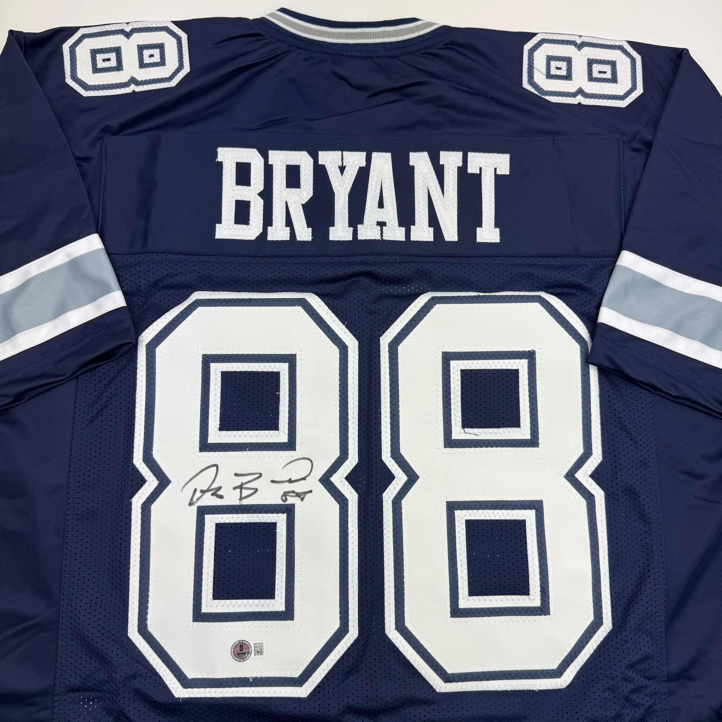 autographed-signed-dez-bryant-dallas-blue-football-jersey-beckett-bas-coa