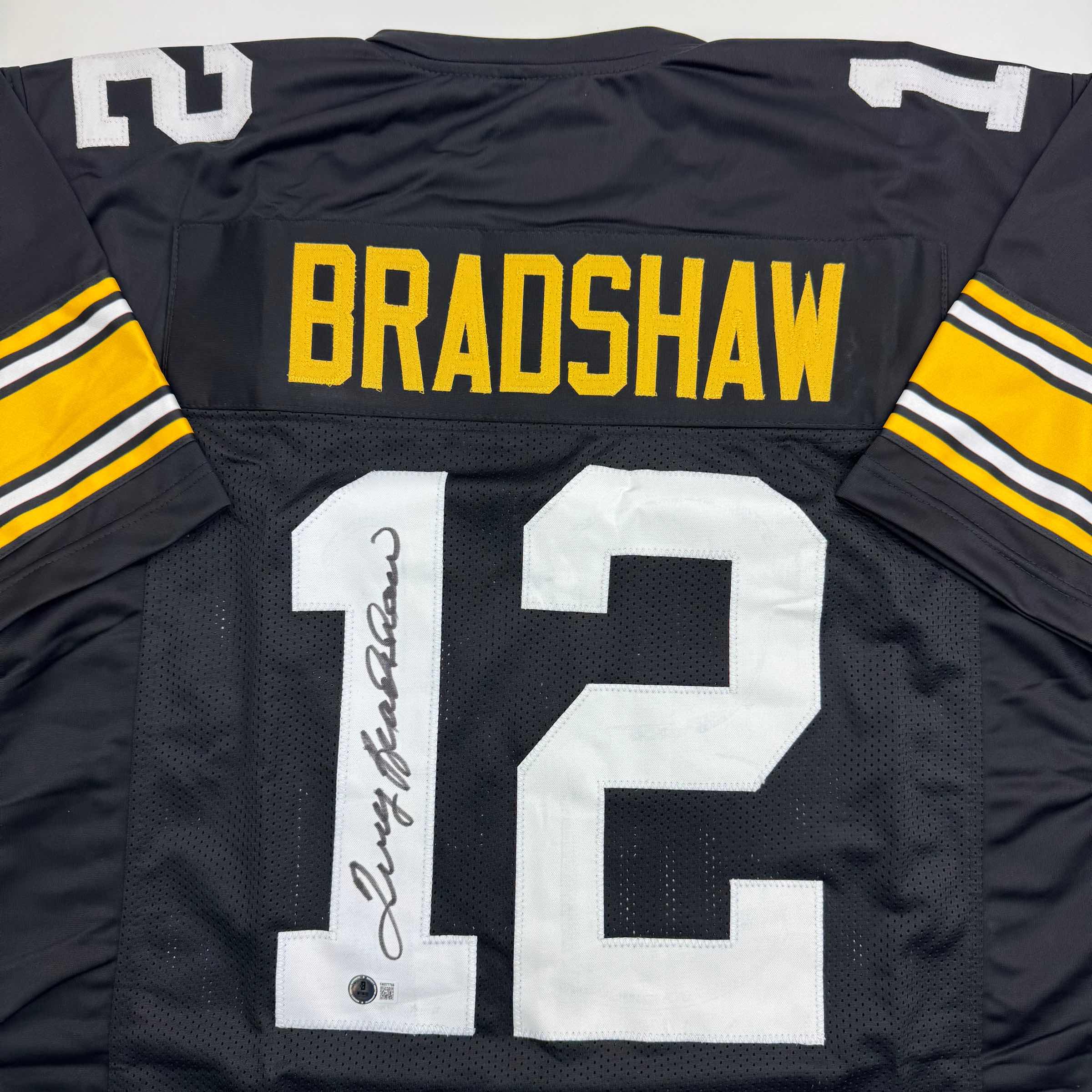 autographed-signed-terry-bradshaw-pittsburgh-black-football-jersey-beckett-bas-coa