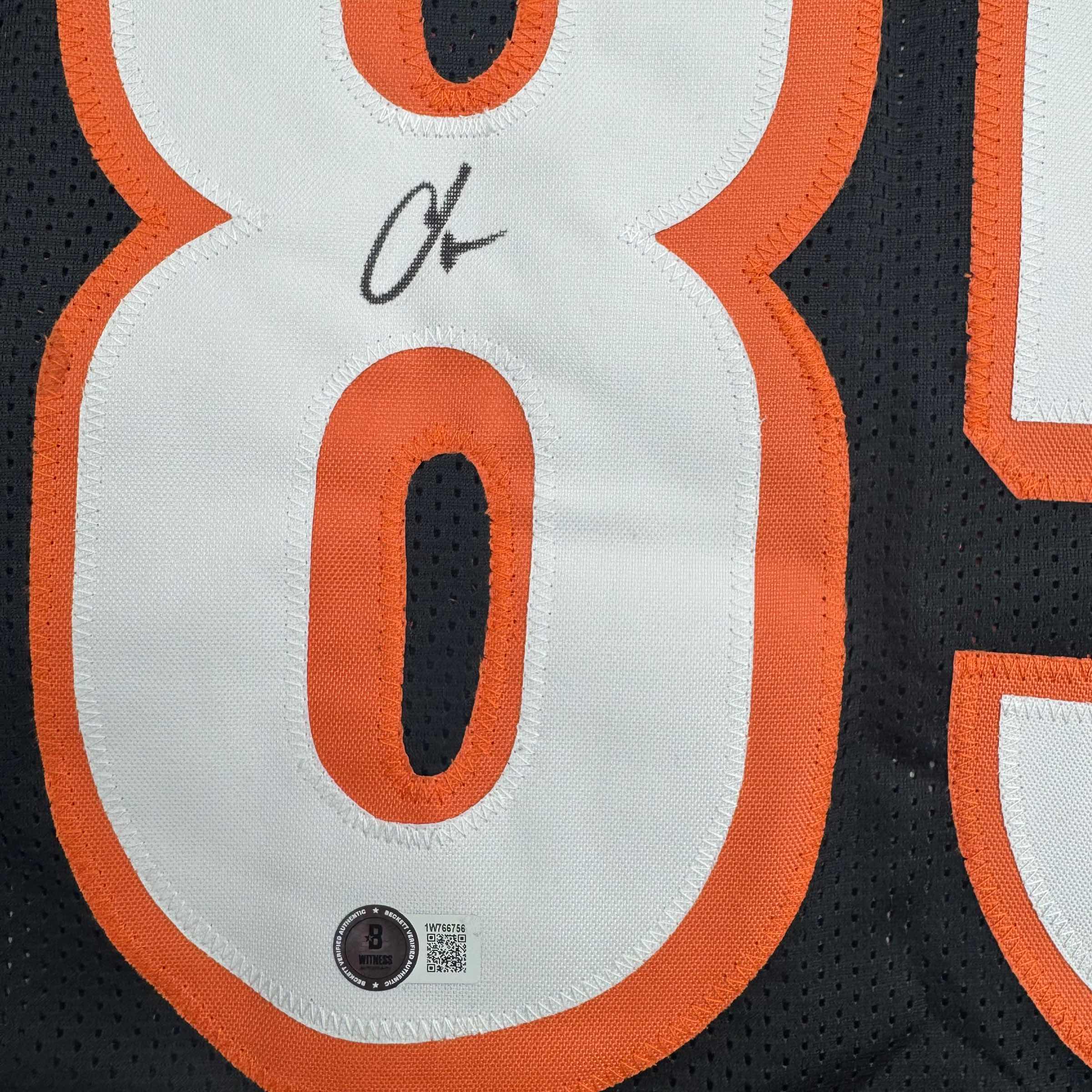 autographed-signed-chad-ochocinco-johnson-cincinnati-black-football-jersey-beckett-bas-coa