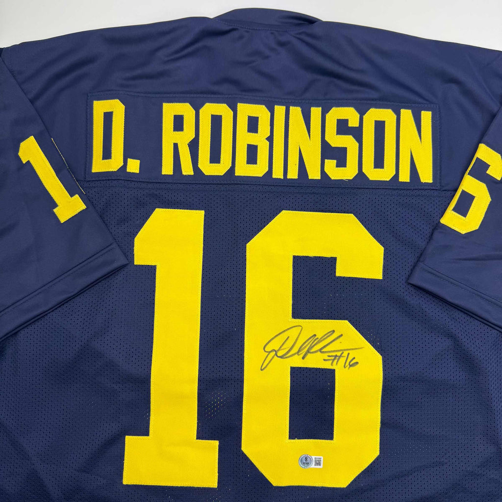 autographed-signed-denard-robinson-michigan-blue-college-football-jersey-beckett-bas-coa