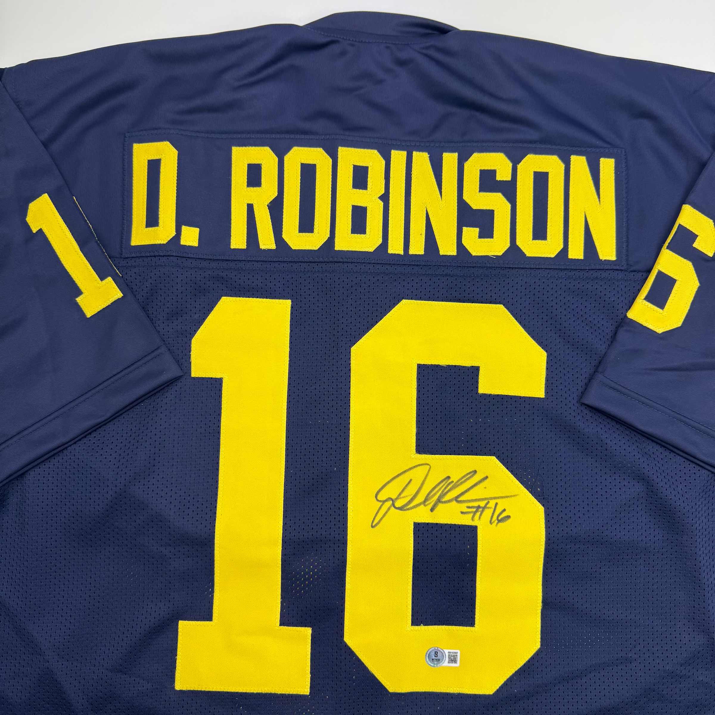 autographed-signed-denard-robinson-michigan-blue-college-football-jersey-beckett-bas-coa