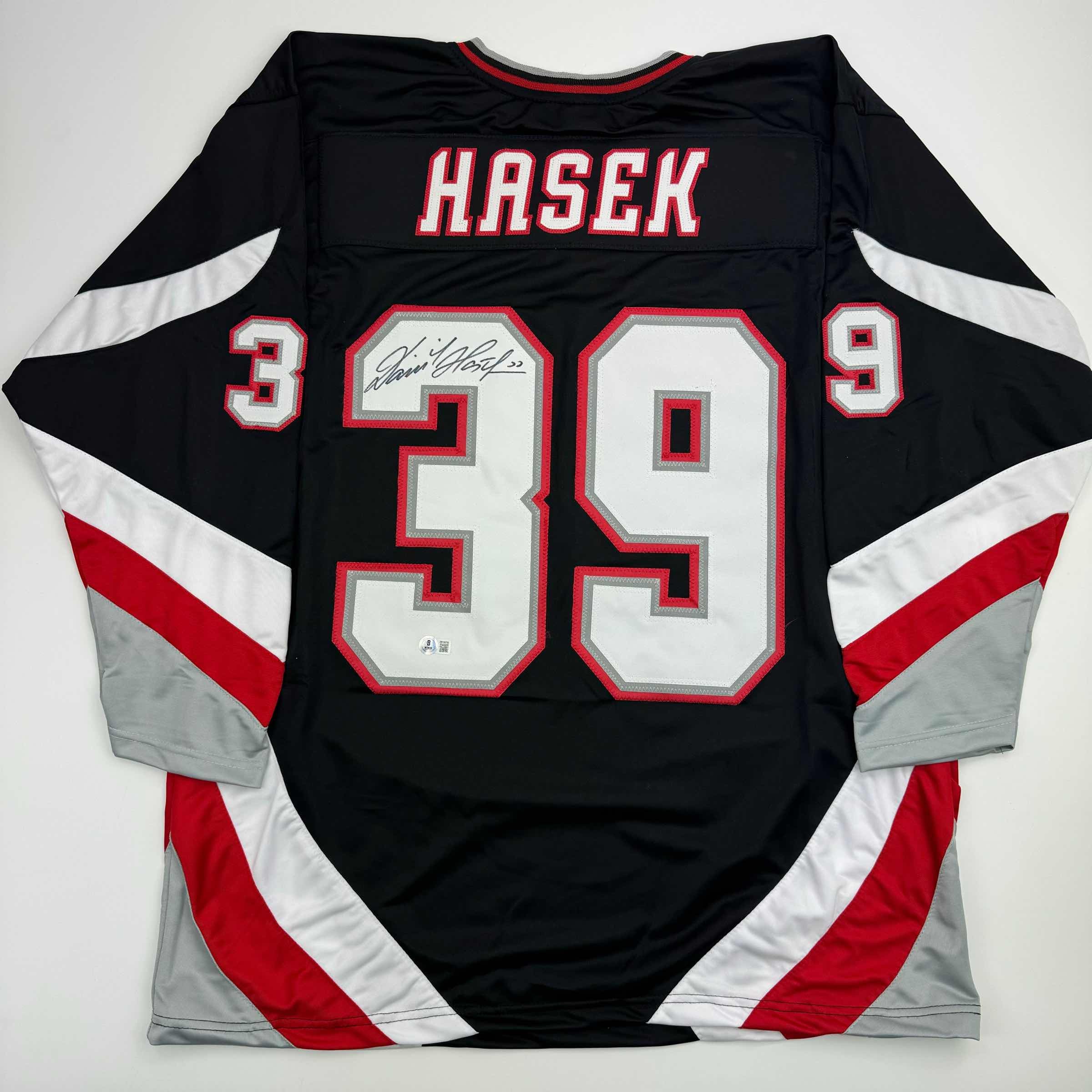 autographed-signed-dominik-hasek-buffalo-black-hockey-jersey-beckett-bas-coa