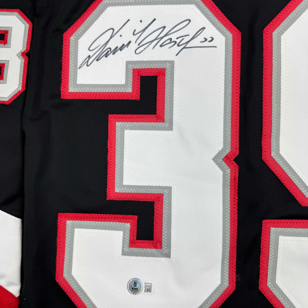 autographed-signed-dominik-hasek-buffalo-black-hockey-jersey-beckett-bas-coa