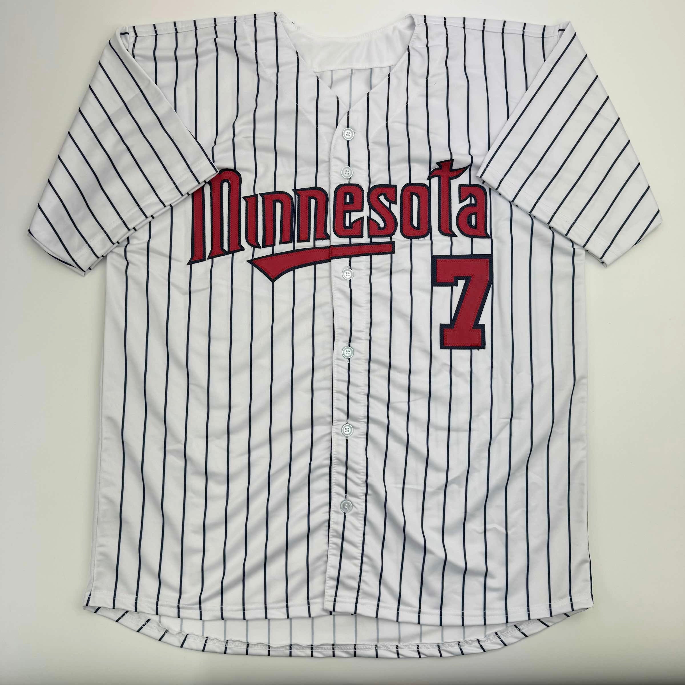 autographed-signed-joe-mauer-minnesota-pinstripe-baseball-jersey-beckett-bas-coa