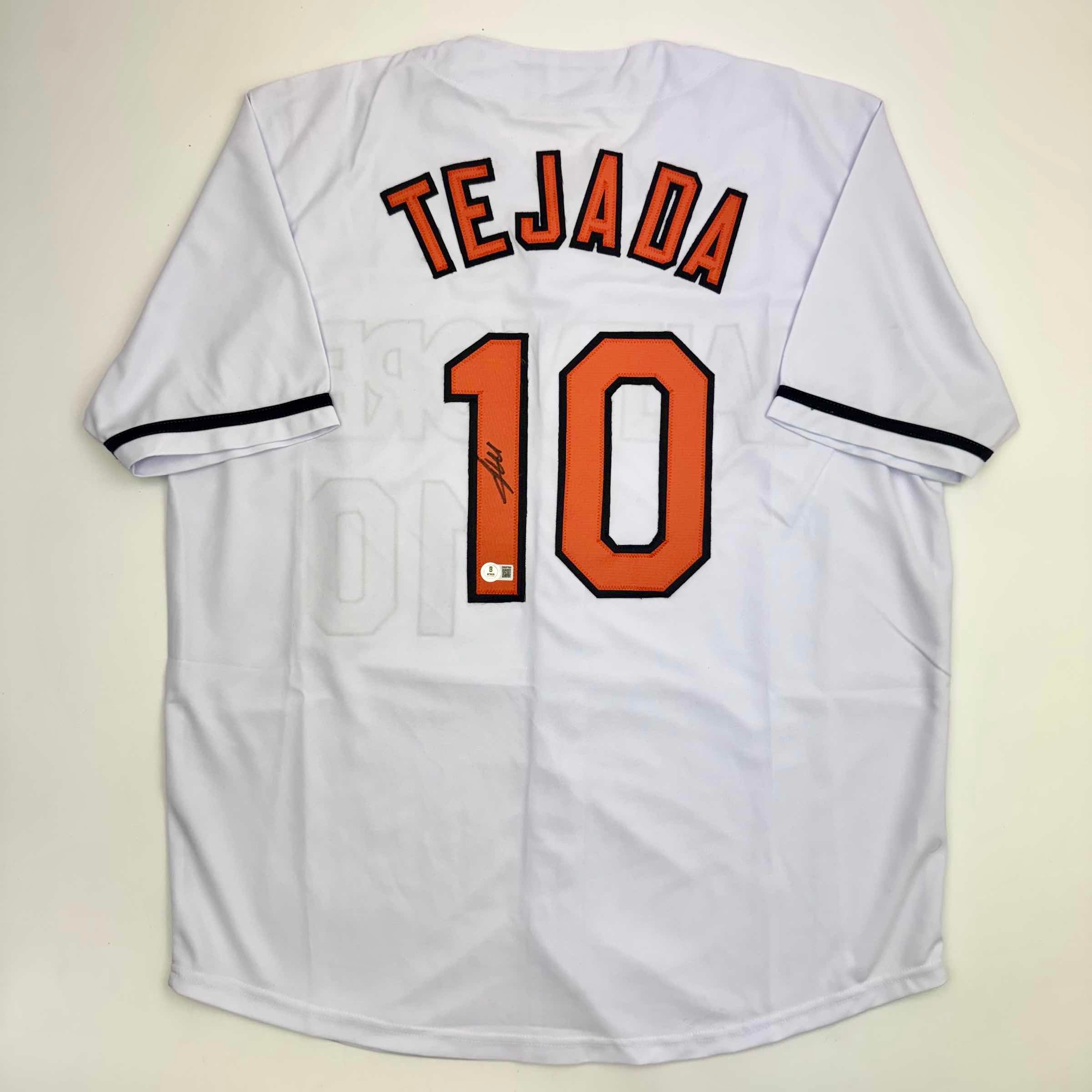 autographed-signed-miguel-tejada-baltimore-white-baseball-jersey-beckett-bas-coa