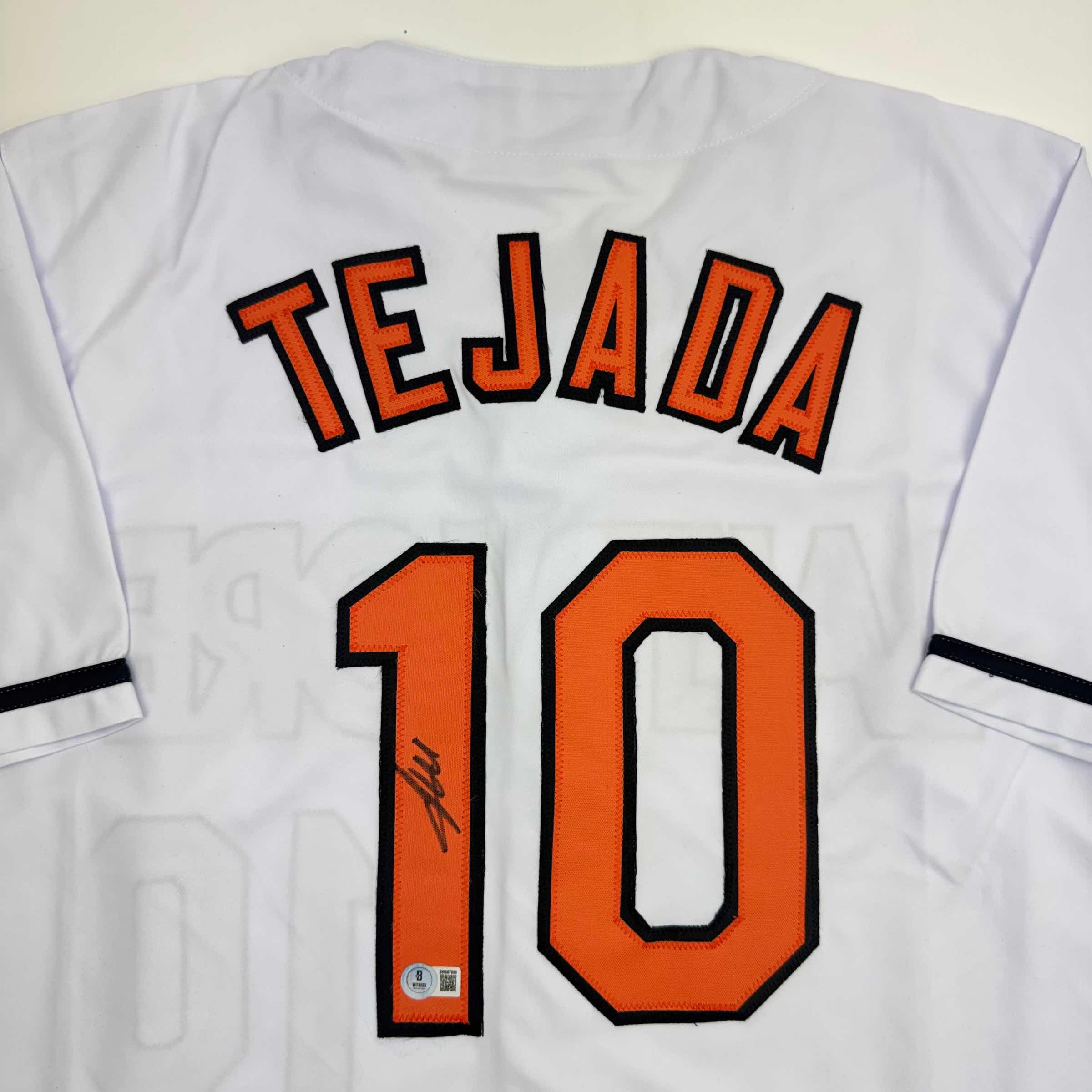 autographed-signed-miguel-tejada-baltimore-white-baseball-jersey-beckett-bas-coa
