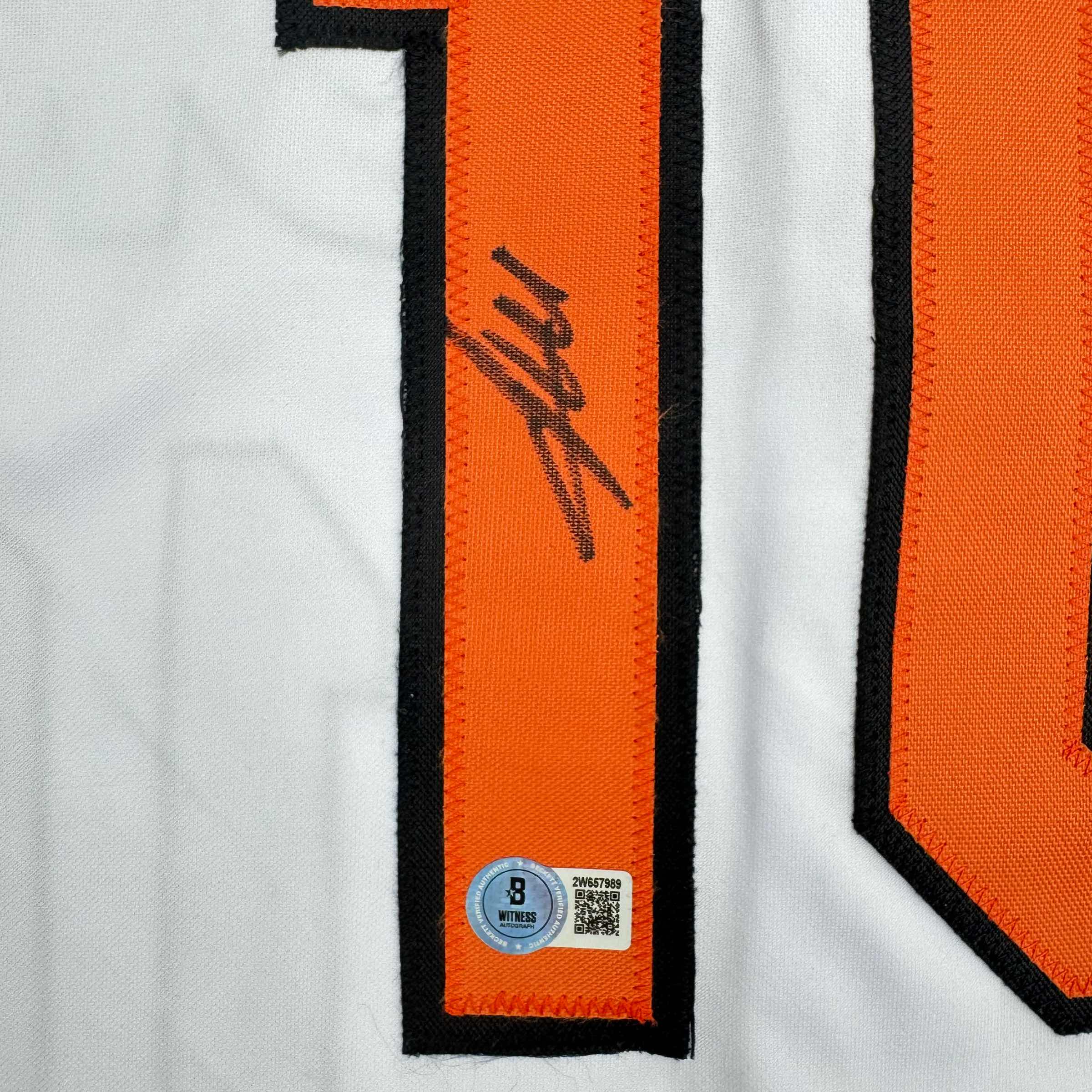 autographed-signed-miguel-tejada-baltimore-white-baseball-jersey-beckett-bas-coa