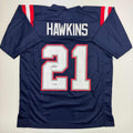 autographed-signed-jaylinn-hawkins-new-england-blue-football-jersey-beckett-bas-coa