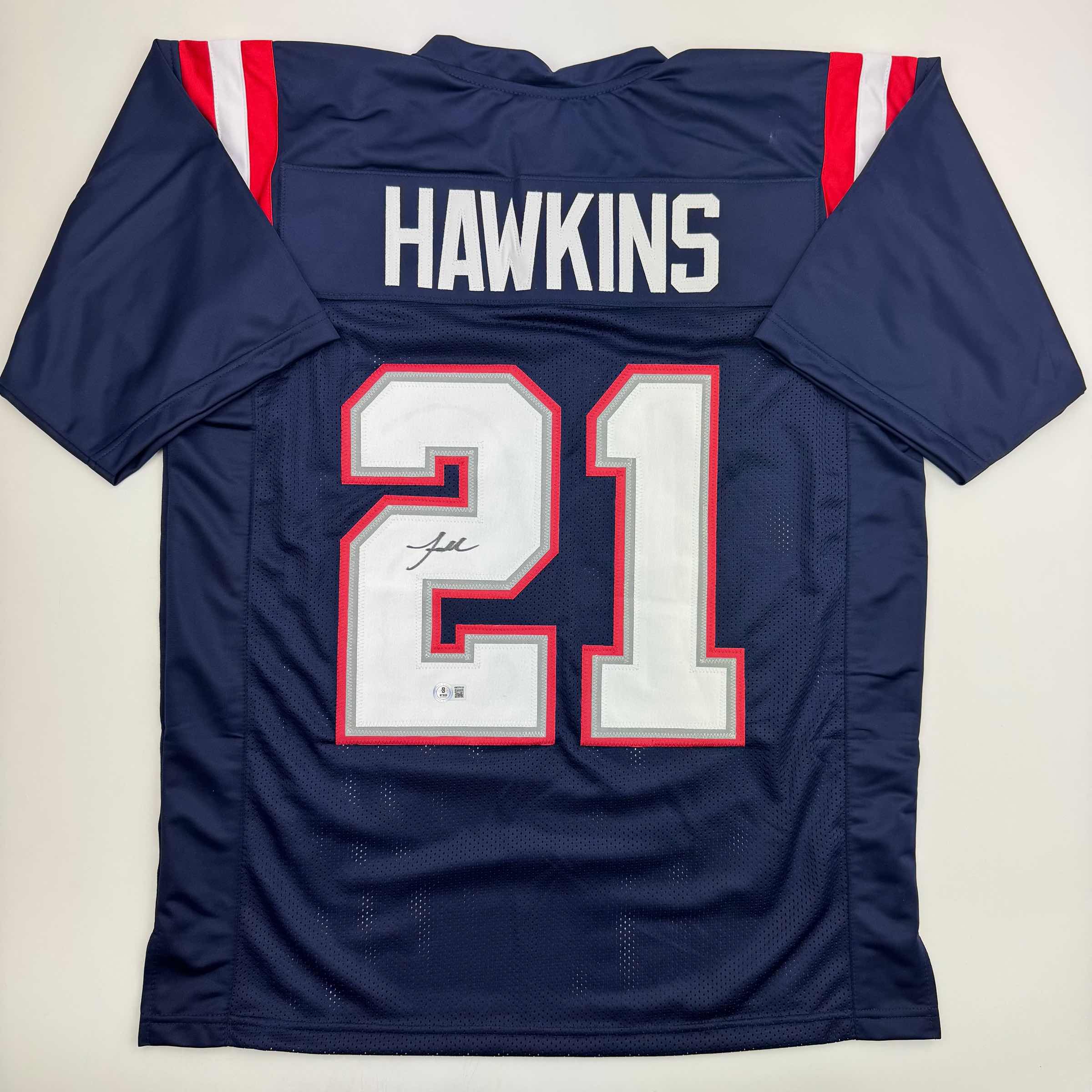 autographed-signed-jaylinn-hawkins-new-england-blue-football-jersey-beckett-bas-coa
