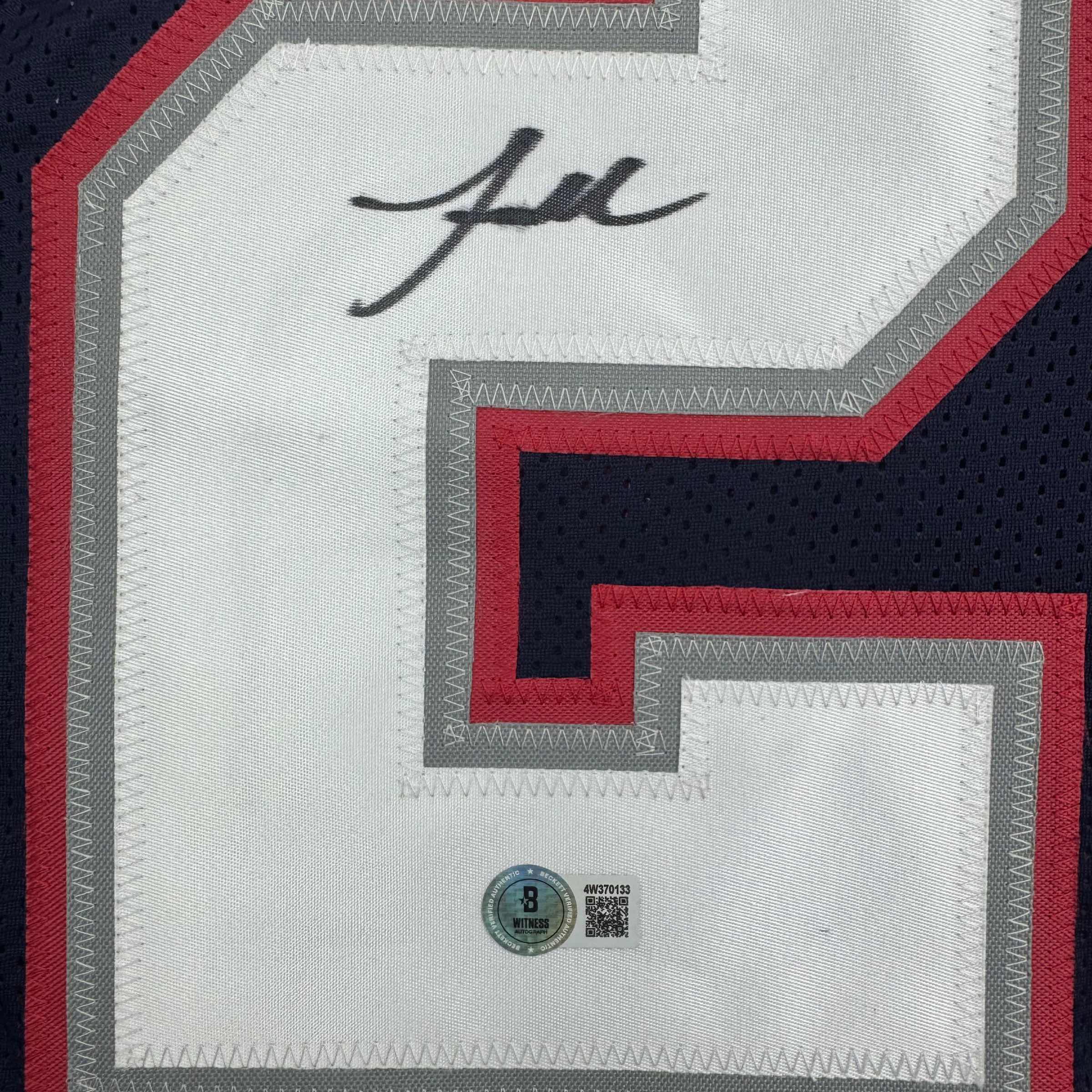autographed-signed-jaylinn-hawkins-new-england-blue-football-jersey-beckett-bas-coa