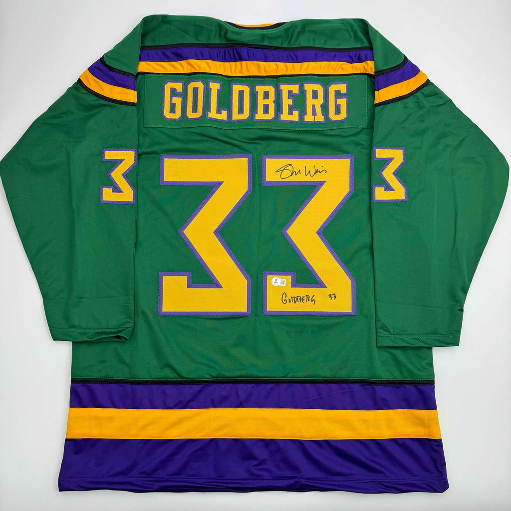 autographed-signed-shaun-weiss-greg-goldberg-the-mighty-ducks-green-hockey-jersey-beckett-bas-coa