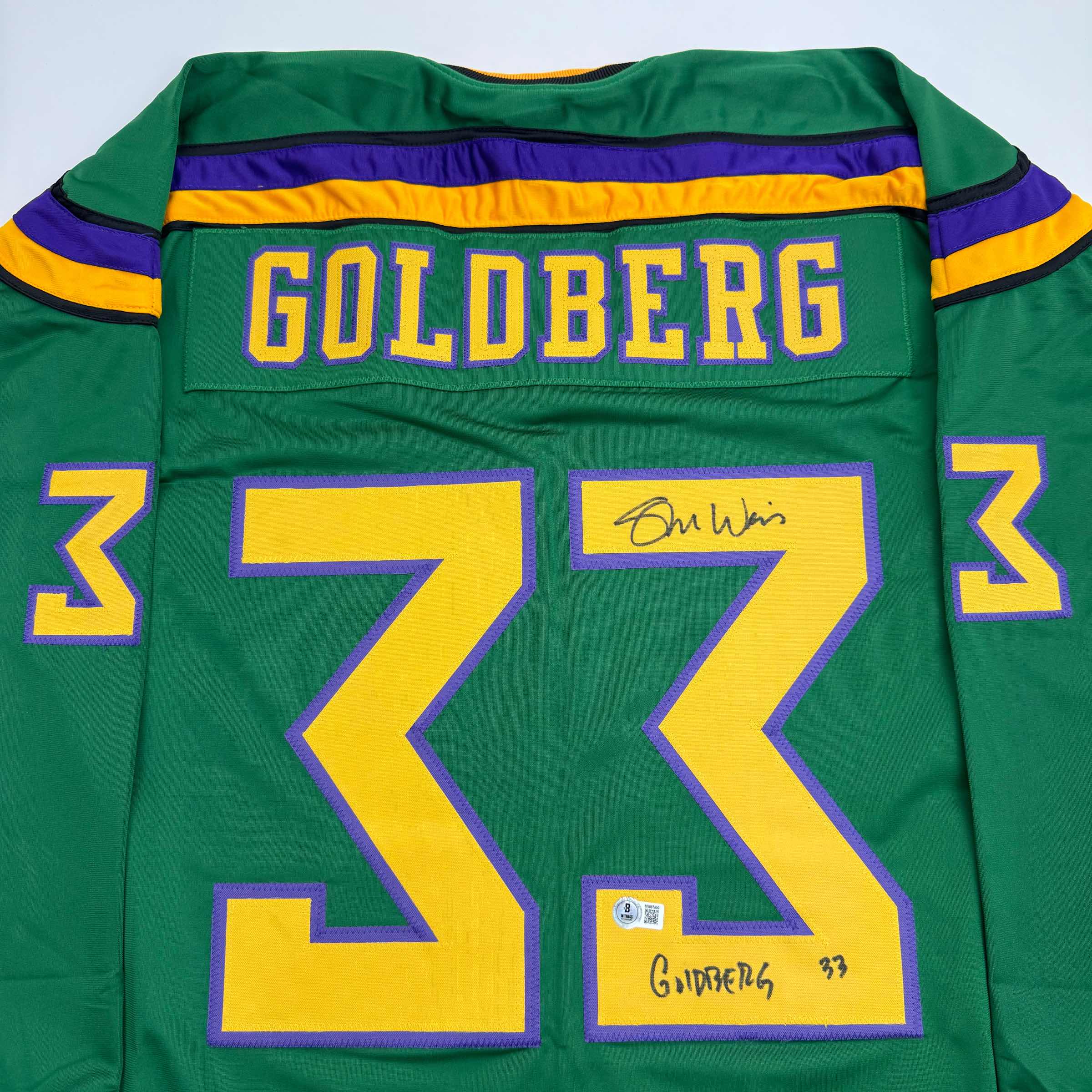 autographed-signed-shaun-weiss-greg-goldberg-the-mighty-ducks-green-hockey-jersey-beckett-bas-coa