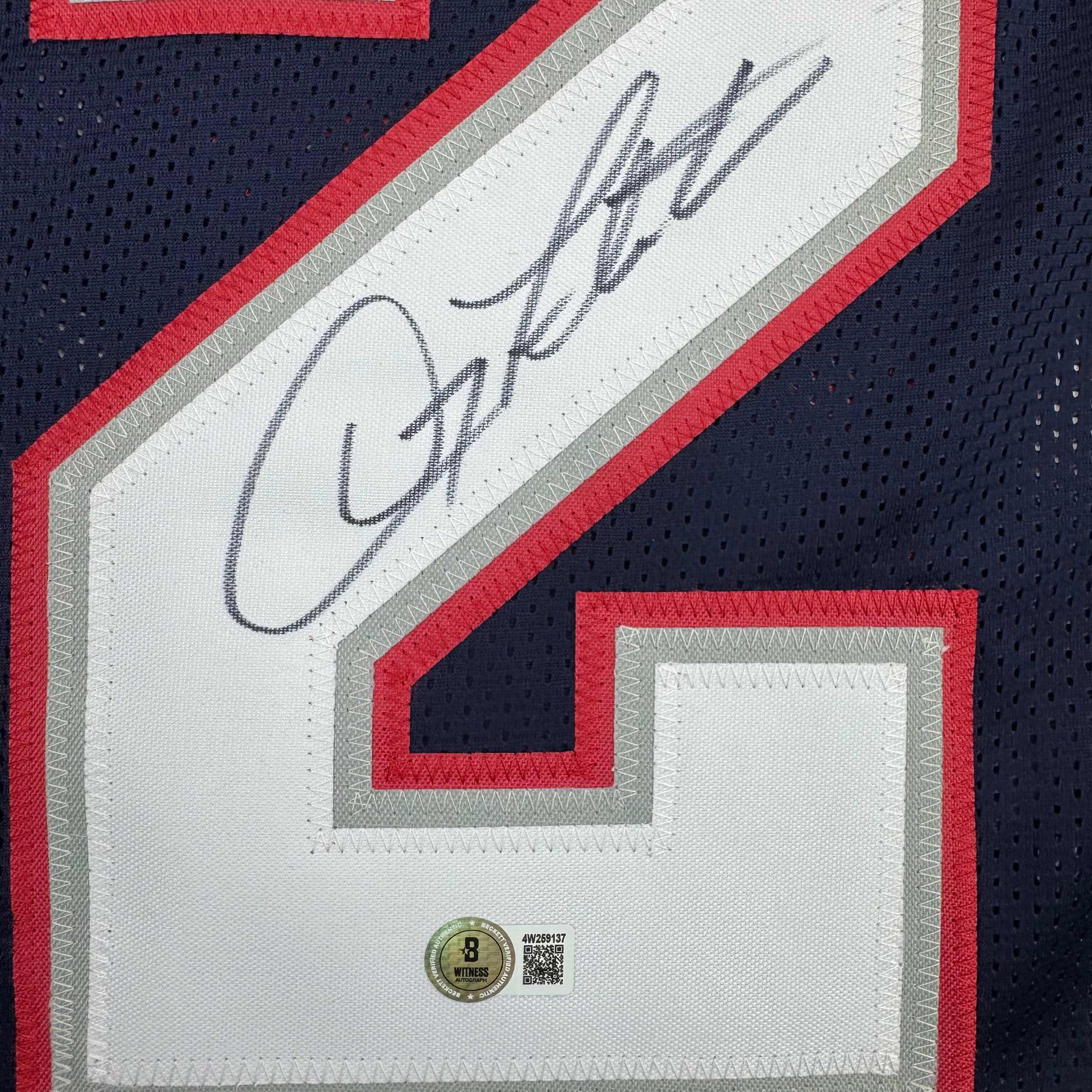 autographed-signed-doug-flutie-new-england-blue-football-jersey-beckett-bas-coa