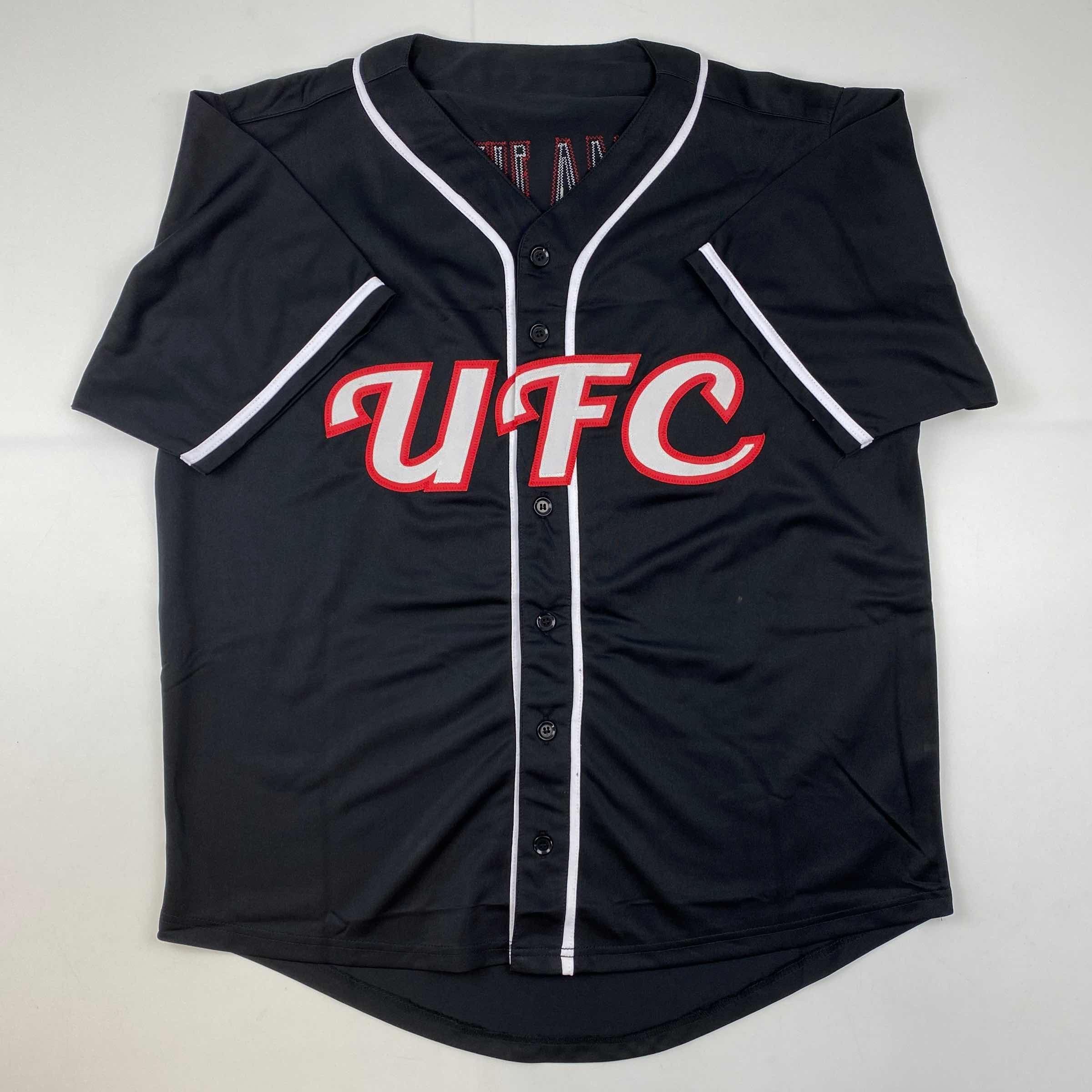 autographed-signed-thug-rose-namajunas-ufc-mma-black-ultimate-fighting-jersey-shirt-psa-dna-coa
