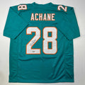 autographed-signed-devon-devon-achane-miami-teal-football-jersey-beckett-bas-coa