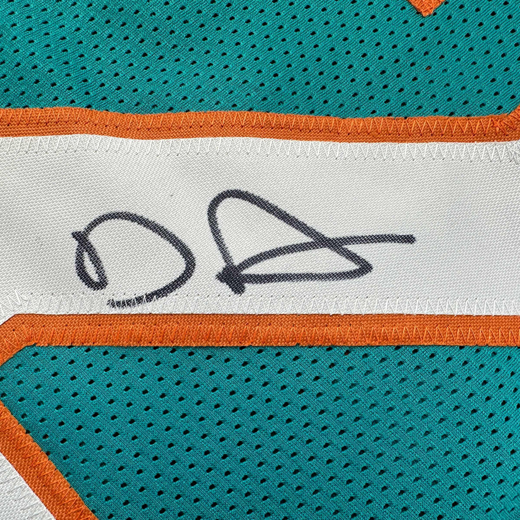 autographed-signed-devon-devon-achane-miami-teal-football-jersey-beckett-bas-coa