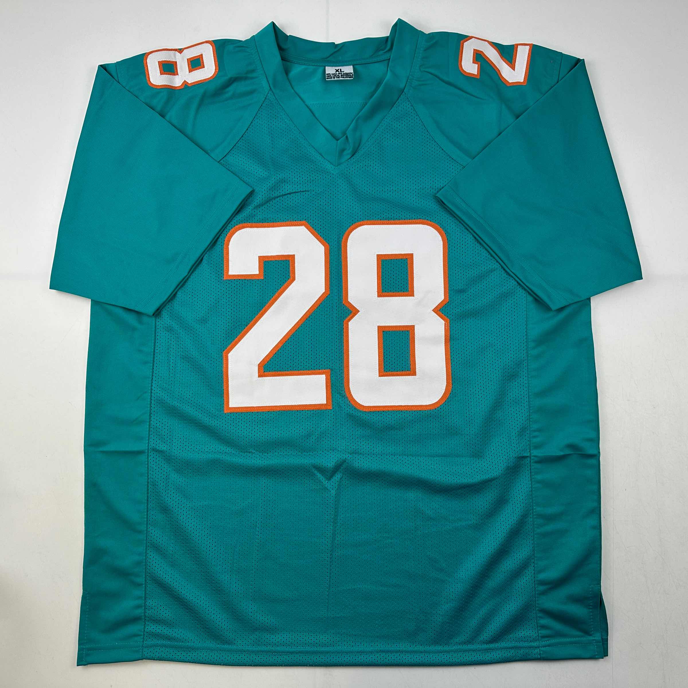 autographed-signed-devon-devon-achane-miami-teal-football-jersey-beckett-bas-coa