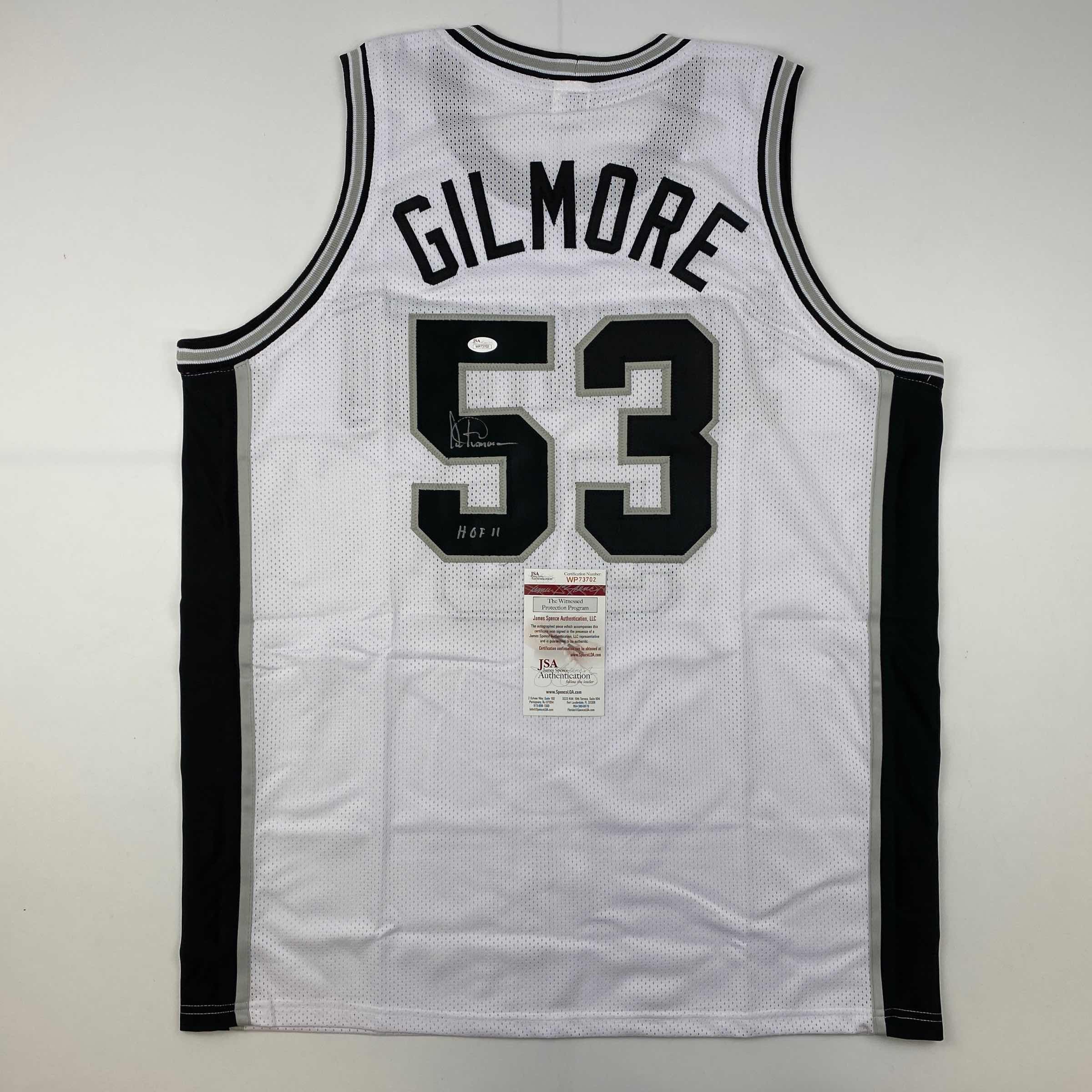 autographed-signed-artis-gilmore-hof-11-san-antonio-white-basketball-jersey-jsa-coa