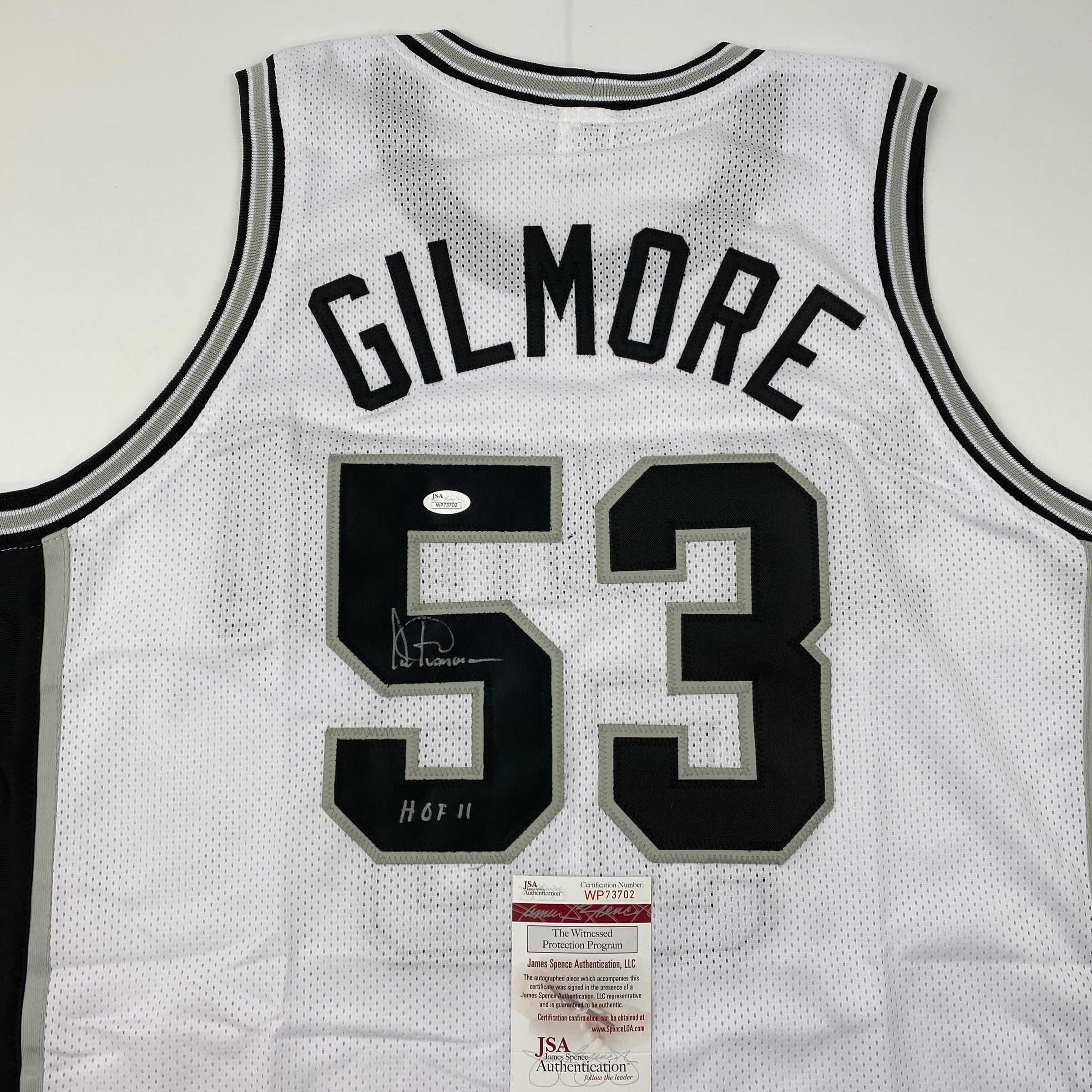 autographed-signed-artis-gilmore-hof-11-san-antonio-white-basketball-jersey-jsa-coa