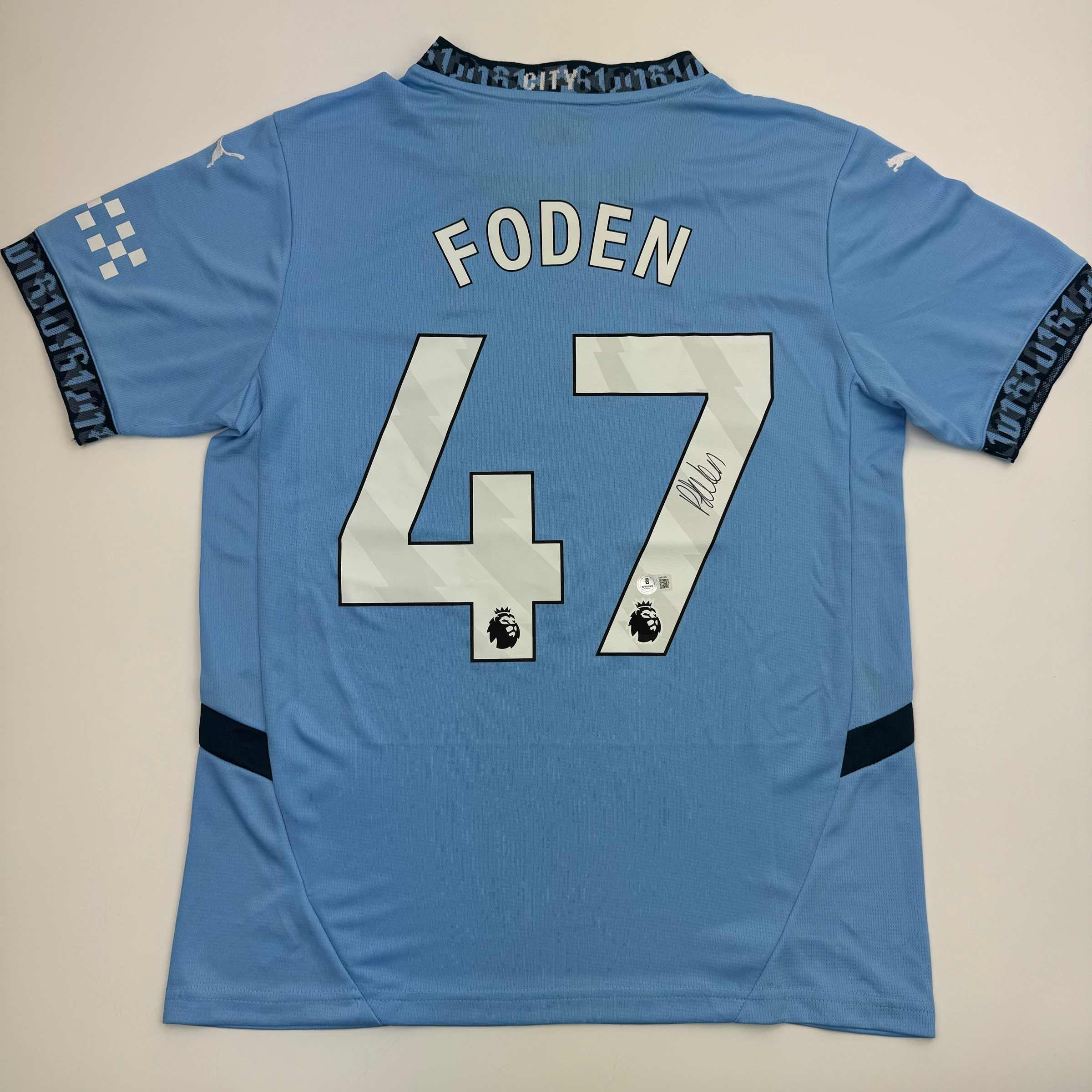 autographed-signed-phil-foden-manchester-city-blue-soccer-futbol-jersey-beckett-bas-coa-3