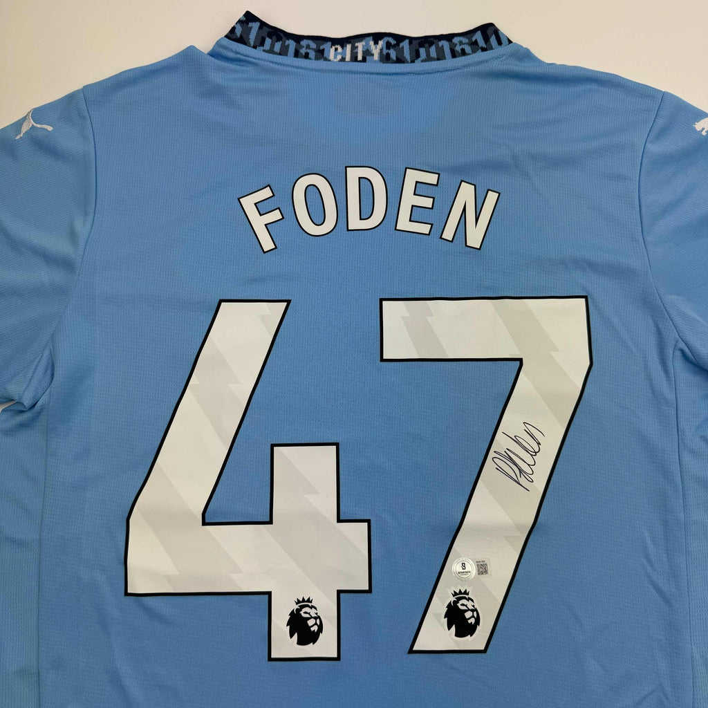 autographed-signed-phil-foden-manchester-city-blue-soccer-futbol-jersey-beckett-bas-coa-3