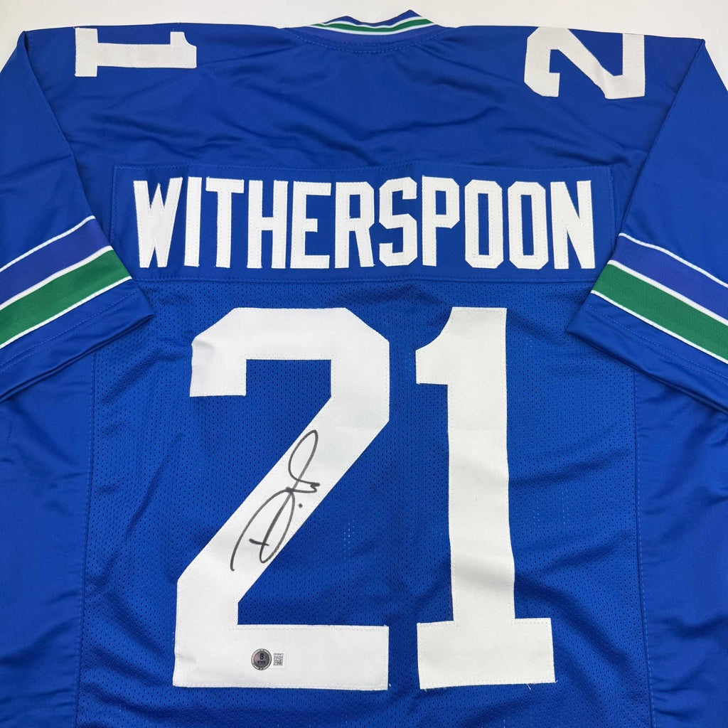 autographed-signed-devon-witherspoon-seattle-blue-retro-football-jersey-beckett-bas-coa