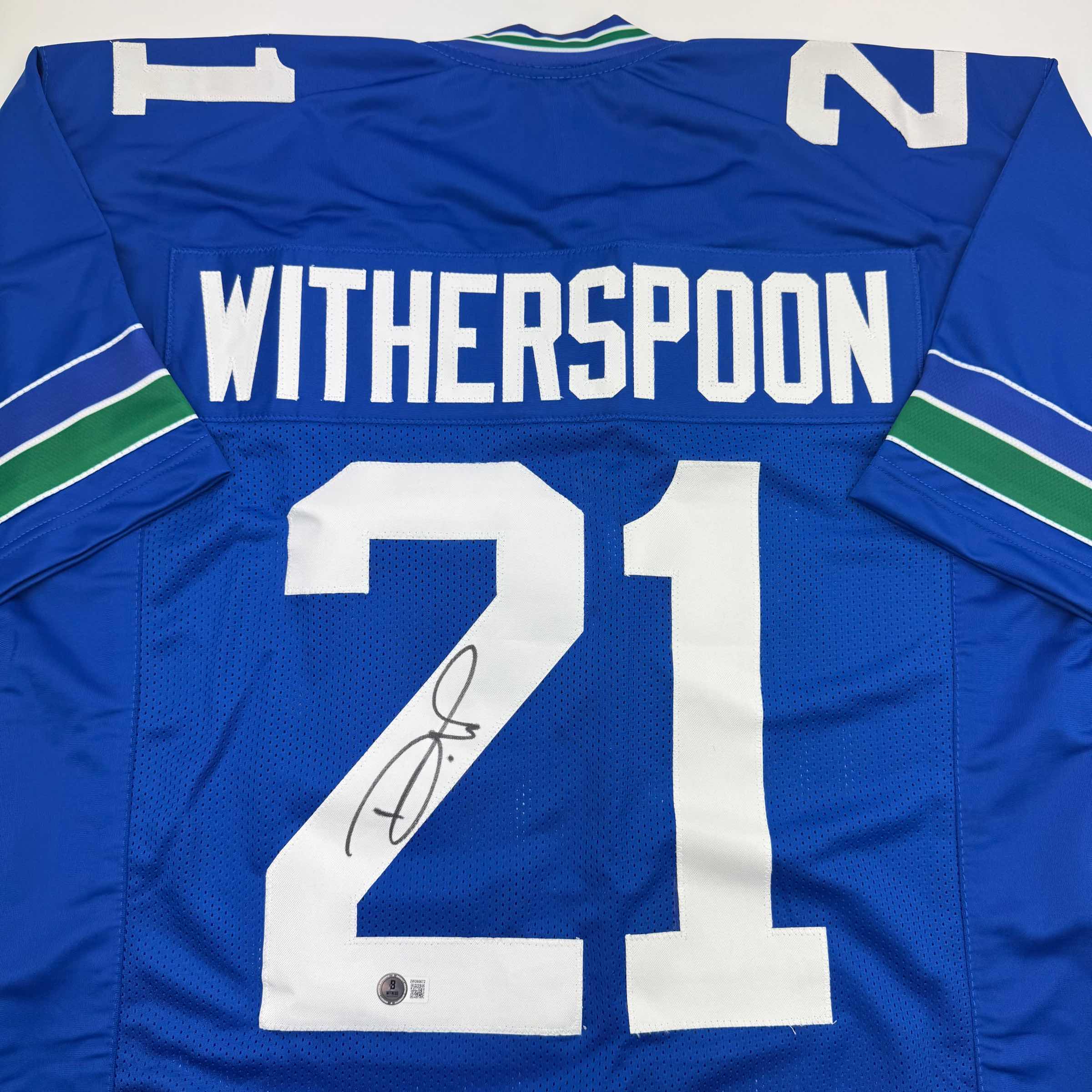autographed-signed-devon-witherspoon-seattle-blue-retro-football-jersey-beckett-bas-coa