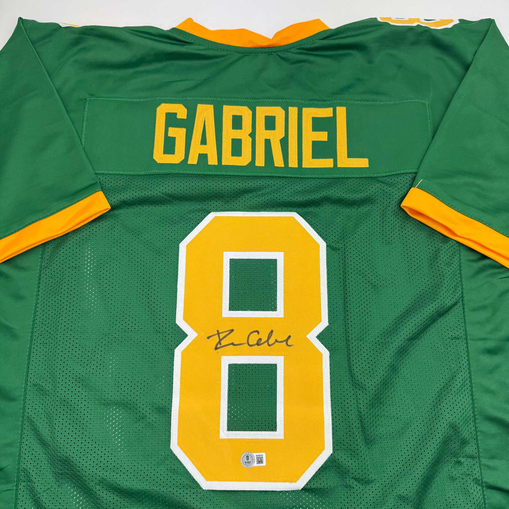 autographed-signed-dillon-gabriel-oregon-green-college-football-jersey-beckett-bas-coa